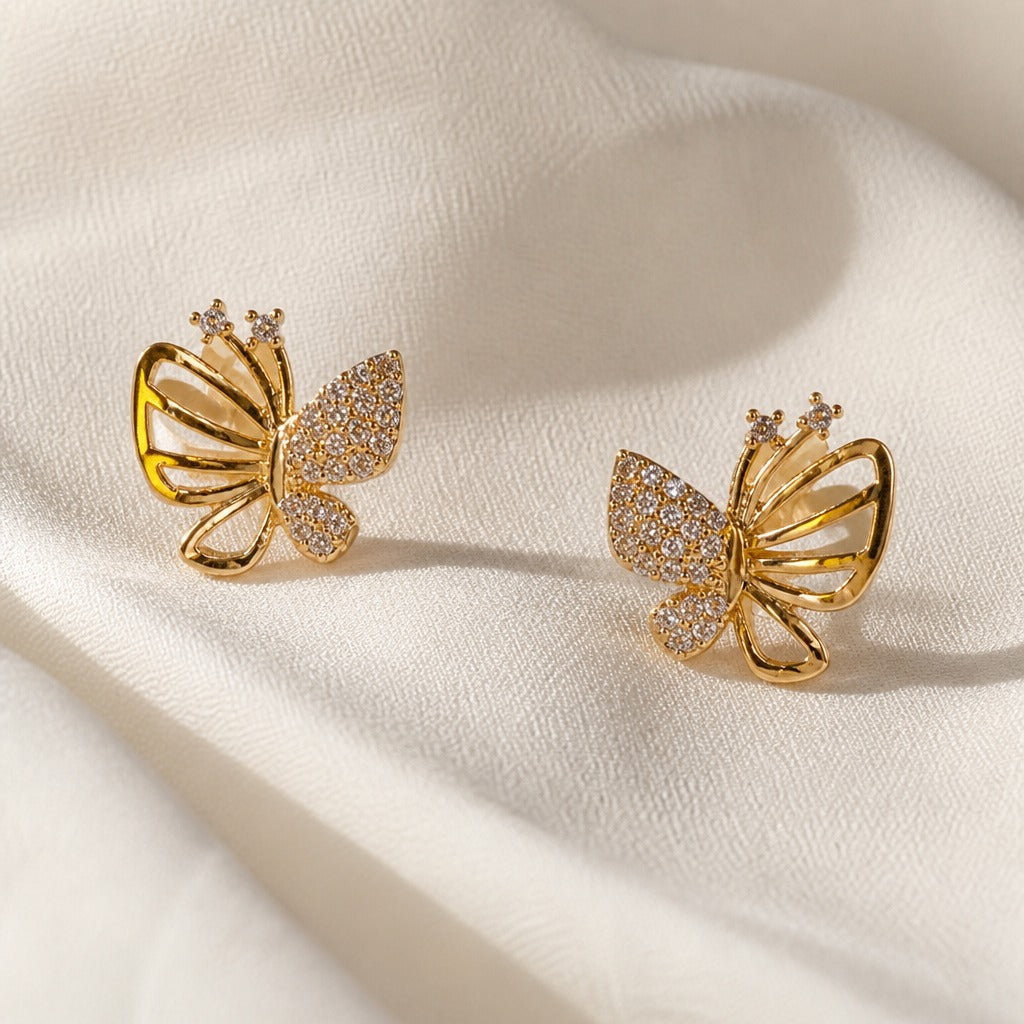Boucles d'oreilles en or zircon papillon creux