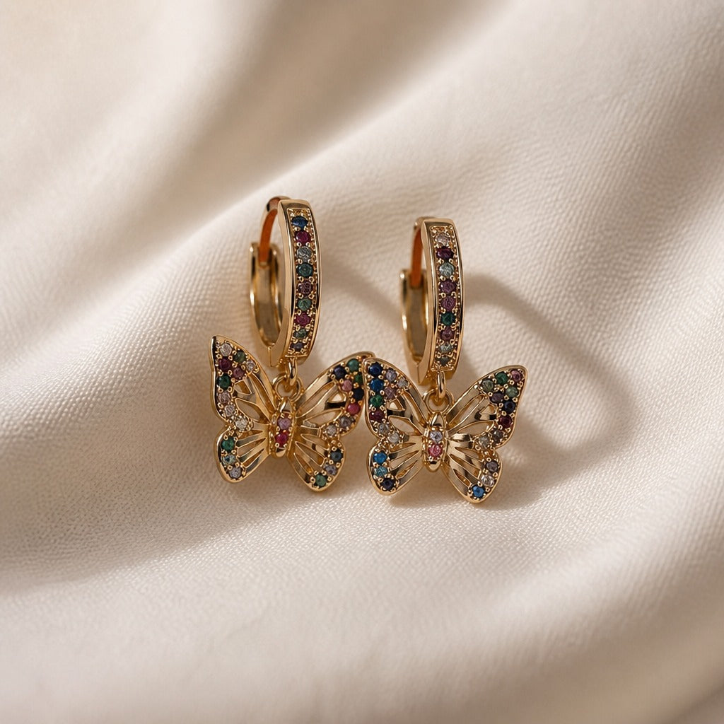 Boucles d'oreilles créoles en zirconium papillon