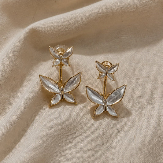 Boucles d'oreilles en or avec papillon en perles